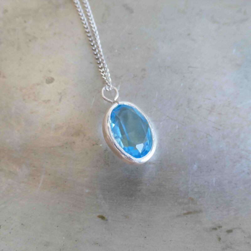 Photo of blue synthetic pendant