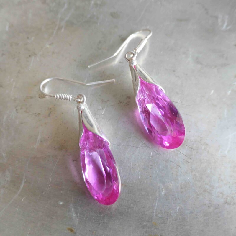Photo of pink synthetic earrings
