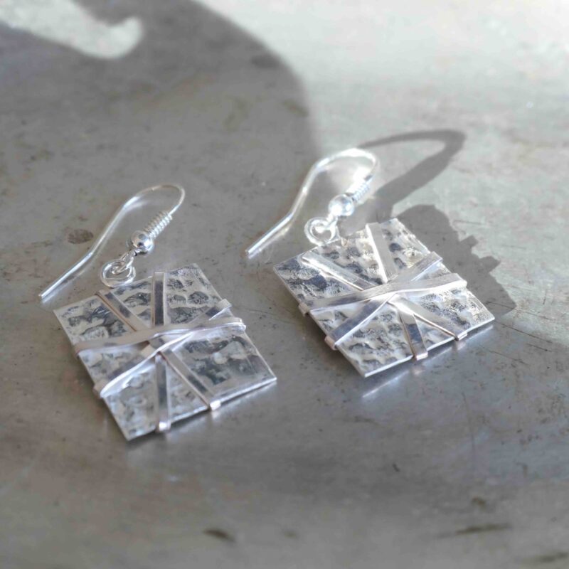 Photo of wicked letters earrings